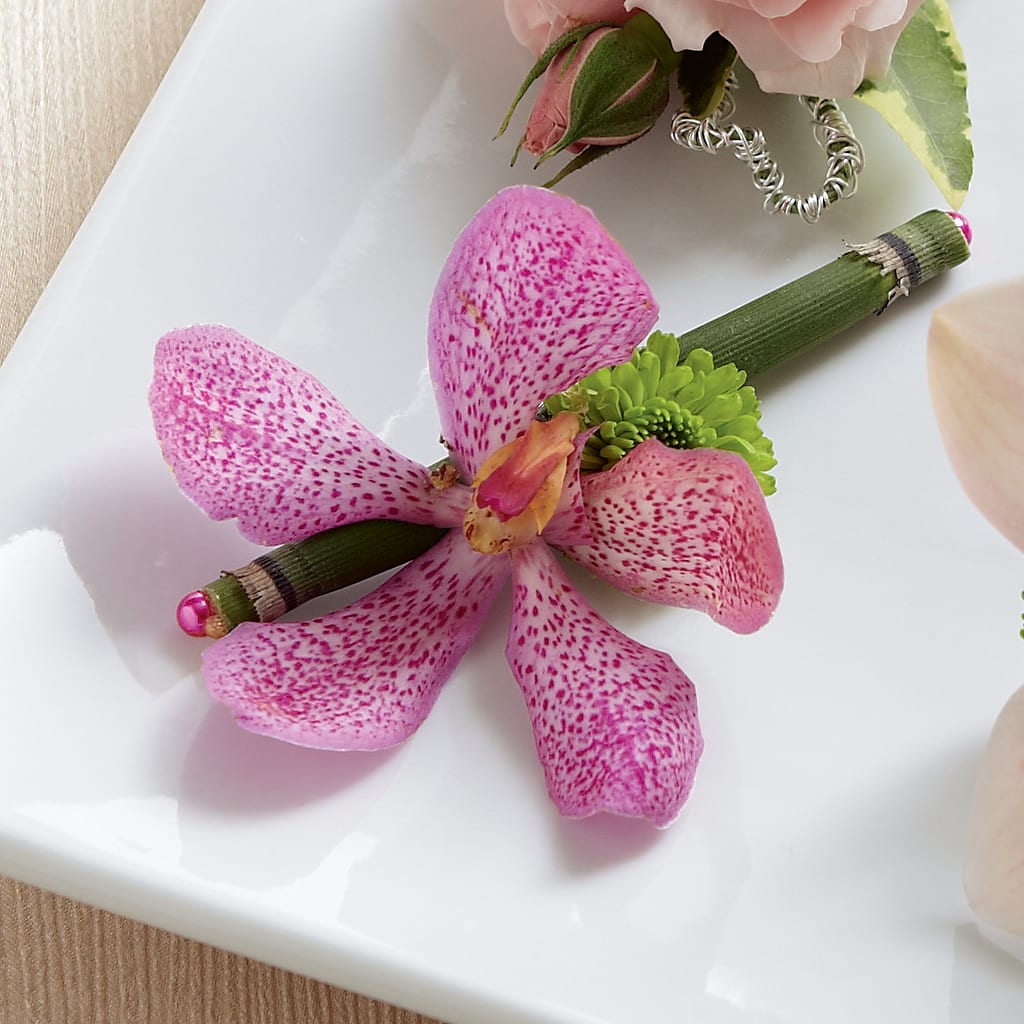 Pink Mokara Boutonniere – South-east Flowers, Los Angeles CA